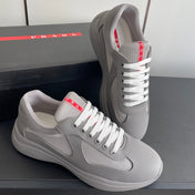 PRADA 26S AMERICA CUP SNEAKERS IN COOL GRAY SOFT RUBBER AND BIKE FABRIC