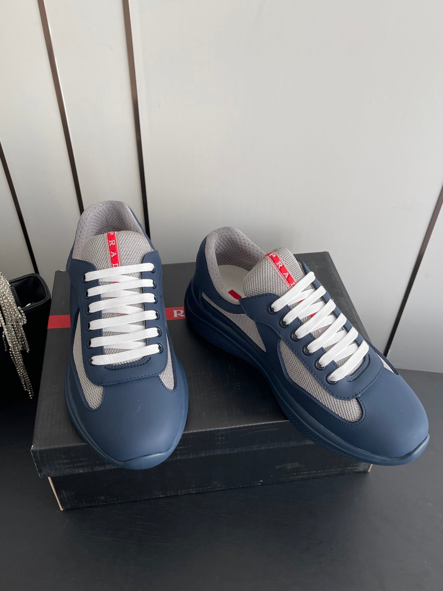 PRADA 26S AMERICA CUP SNEAKERS IN SLATE BLUE SOFT RUBBER AND BIKE FABRIC