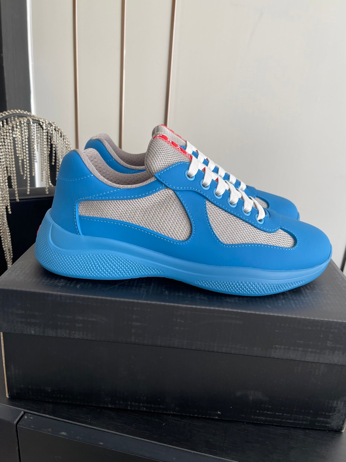 PRADA 26S AMERICA CUP SNEAKERS IN AZURE BLUE SOFT RUBBER AND BIKE FABRIC