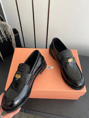 MIUMIU 26S PENNY LOAFERS IN BLACK GLOSSY CALFSKIN GOLD HARDWARE