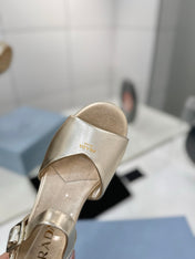 PRADA 26S HEELED SANDALS 70MM IN GOLD CALFSKIN