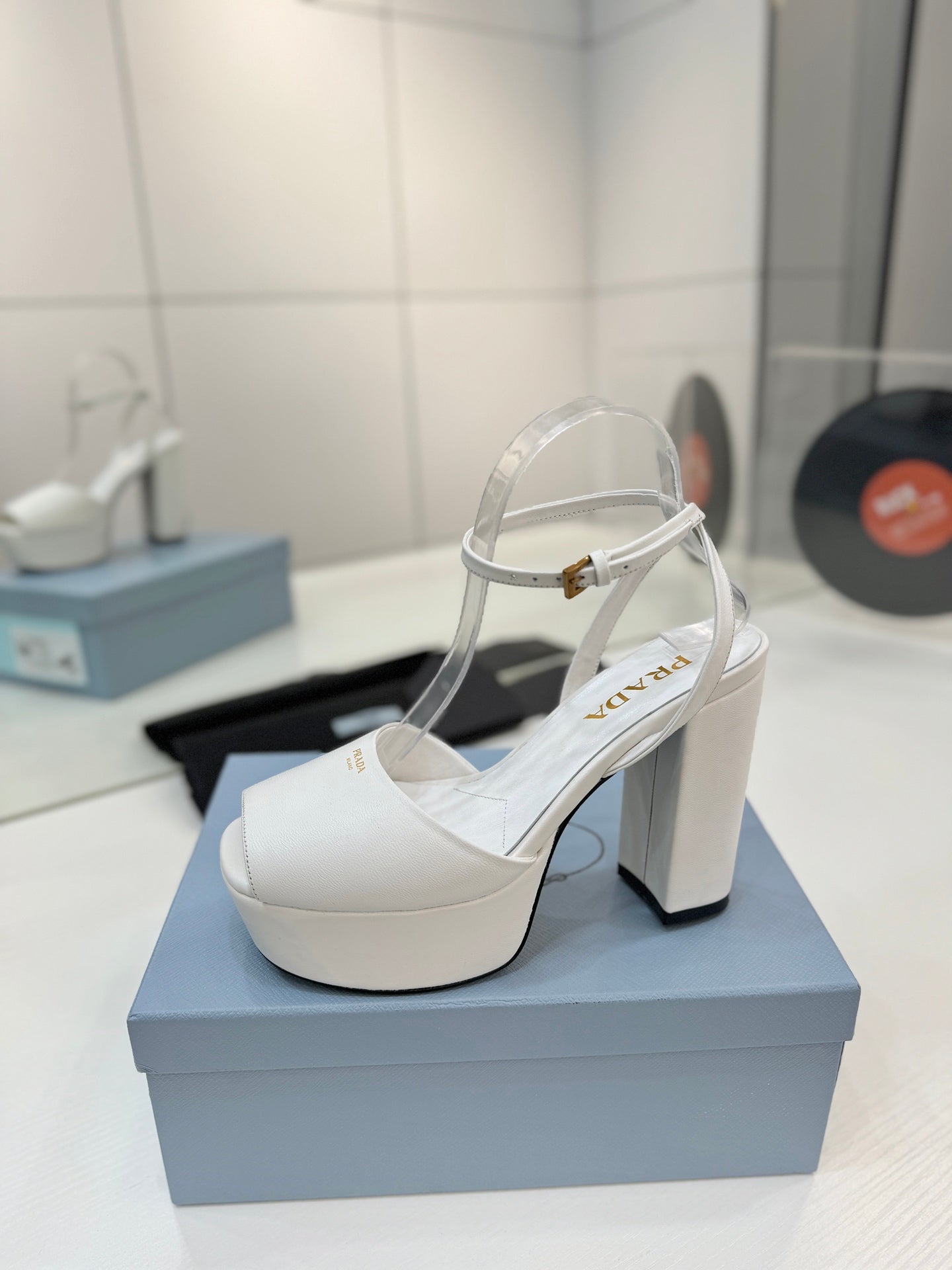 PRADA 26S HEELED SANDALS 115MM IN WHITE CALFSKIN
