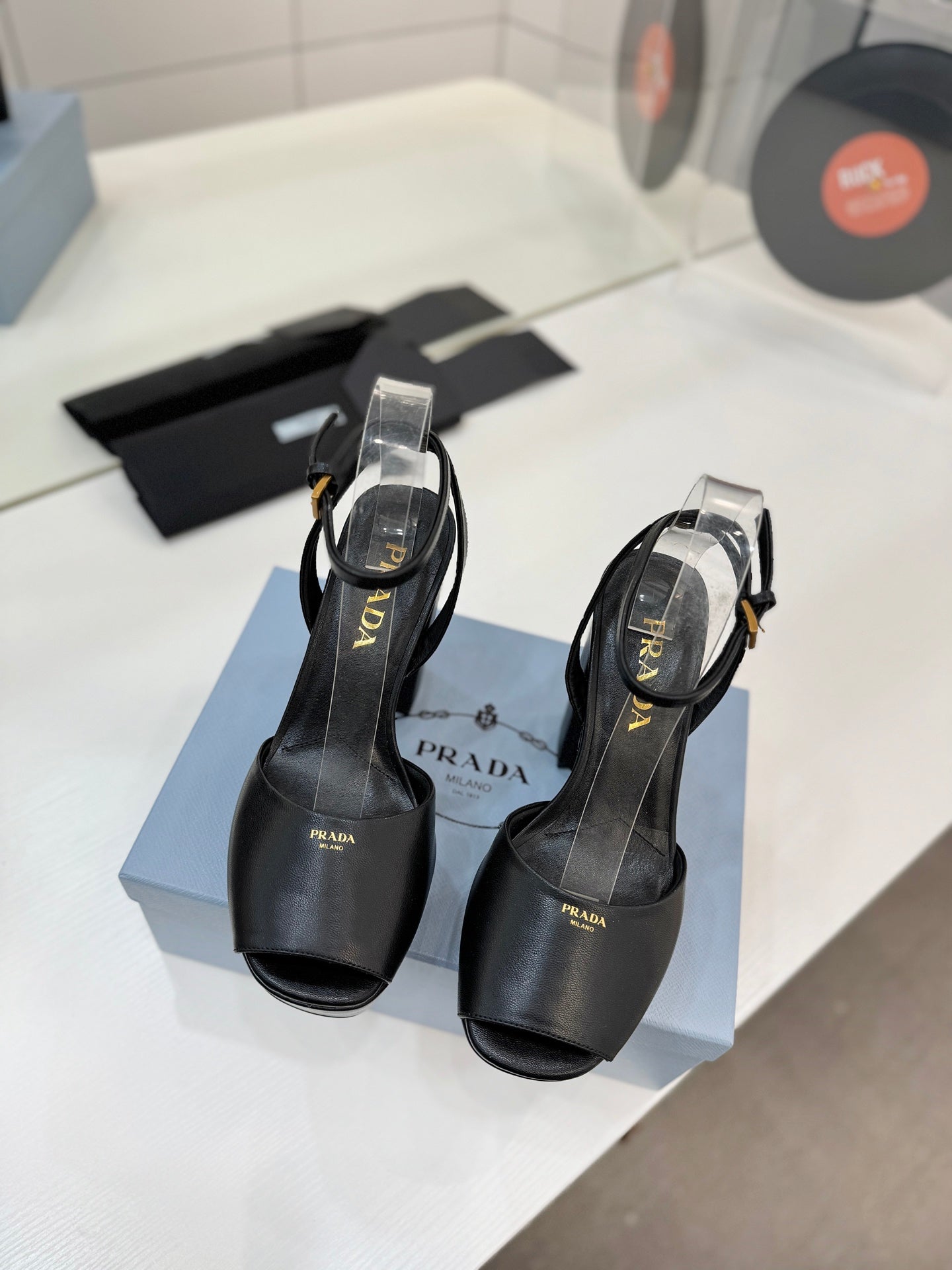 PRADA 26S HEELED SANDALS 115MM IN BLACK CALFSKIN