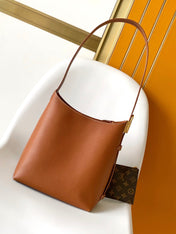 LV 25S LOW KEY HOBO BAG 28 CM IN BURNT ORANGE CALFSKIN