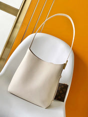 LV 25S LOW KEY HOBO BAG 28 CM IN CREAM WHITE CALFSKIN