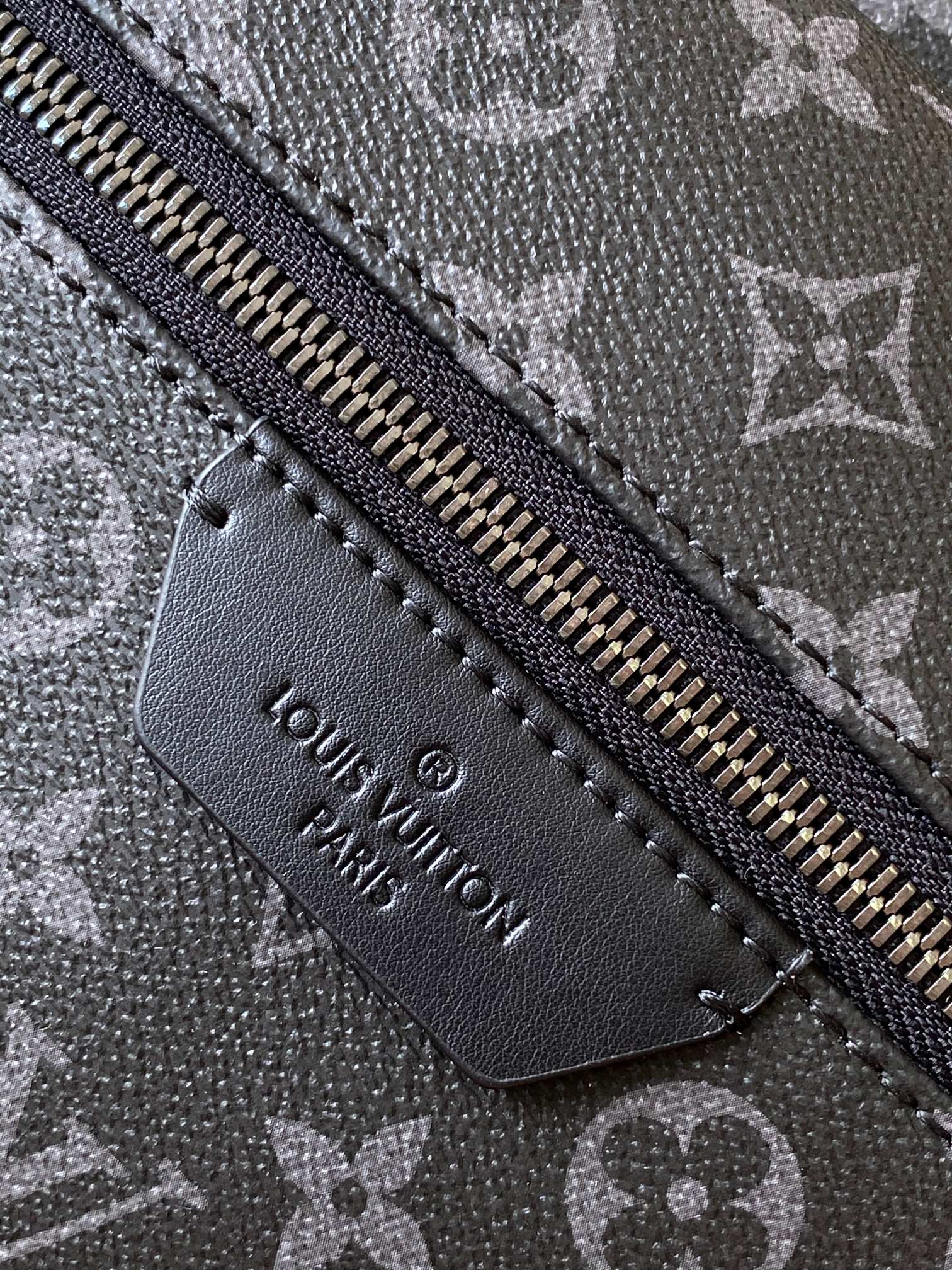 DISCOVERY BACKPACK 38 IN BLACK MONOGRAM ECLIPSE CANVAS AND TAURILLON