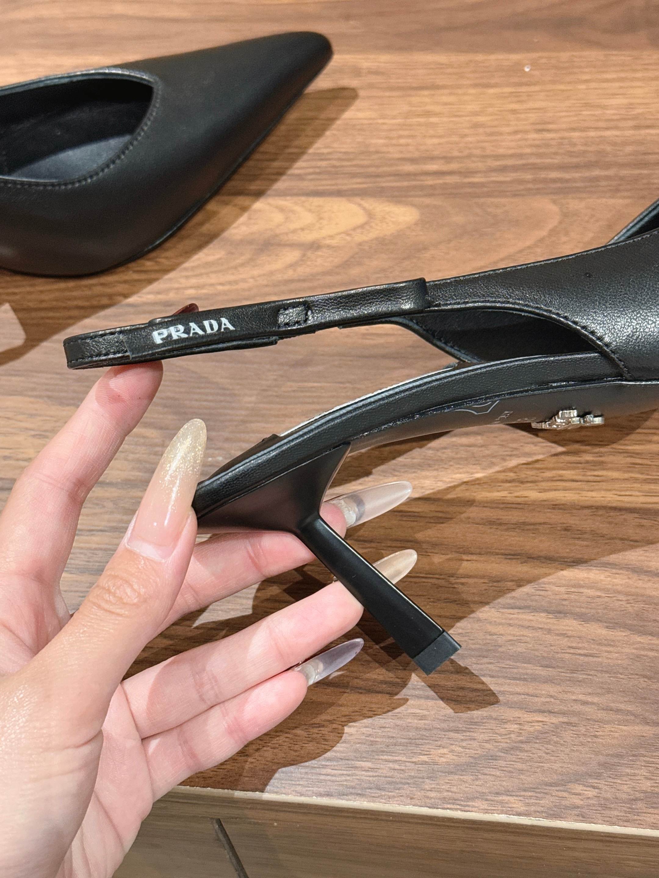 PRADA 26S SLINGBACK PUMPS IN BLACK CALFSKIN
