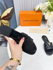 LV 26S MARE FLAT MULES IN BLACK CALFSKIN