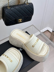 PLATFORM SLIPPERS IN WHITE LAMBSKIN
