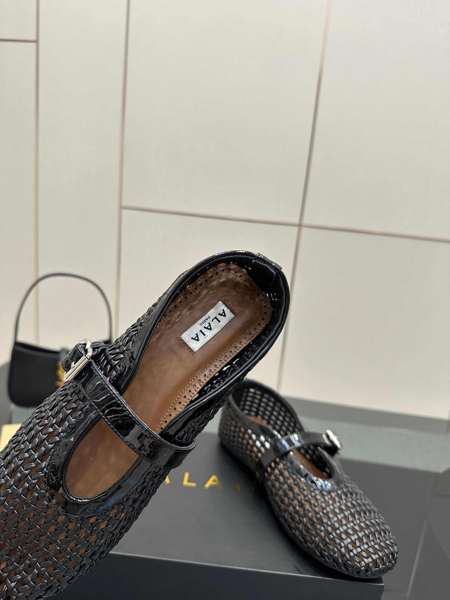 ALAIA MARY JANE FLAT 25S IN BLACK WOVEN MESH