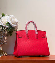 KELLY SELLIER 25 BAG IN CLASSIC RED OSTRICH LEATHER WITH GOLD HARDWARE