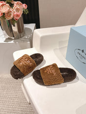 PRADA 25S FLAT MULES IN DARK BROWN RABBIT FUR