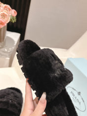 PRADA 25S FLAT MULES IN BLACK RABBIT FUR