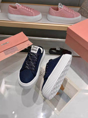 MIUMIU 26S SNEAKER MULES 45MM IN NAVY BLUE MESH