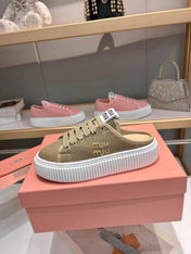 MIUMIU 26S SNEAKER MULES 45MM IN OLIVE GREEN MESH