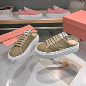 MIUMIU 26S SNEAKER MULES 45MM IN OLIVE GREEN MESH