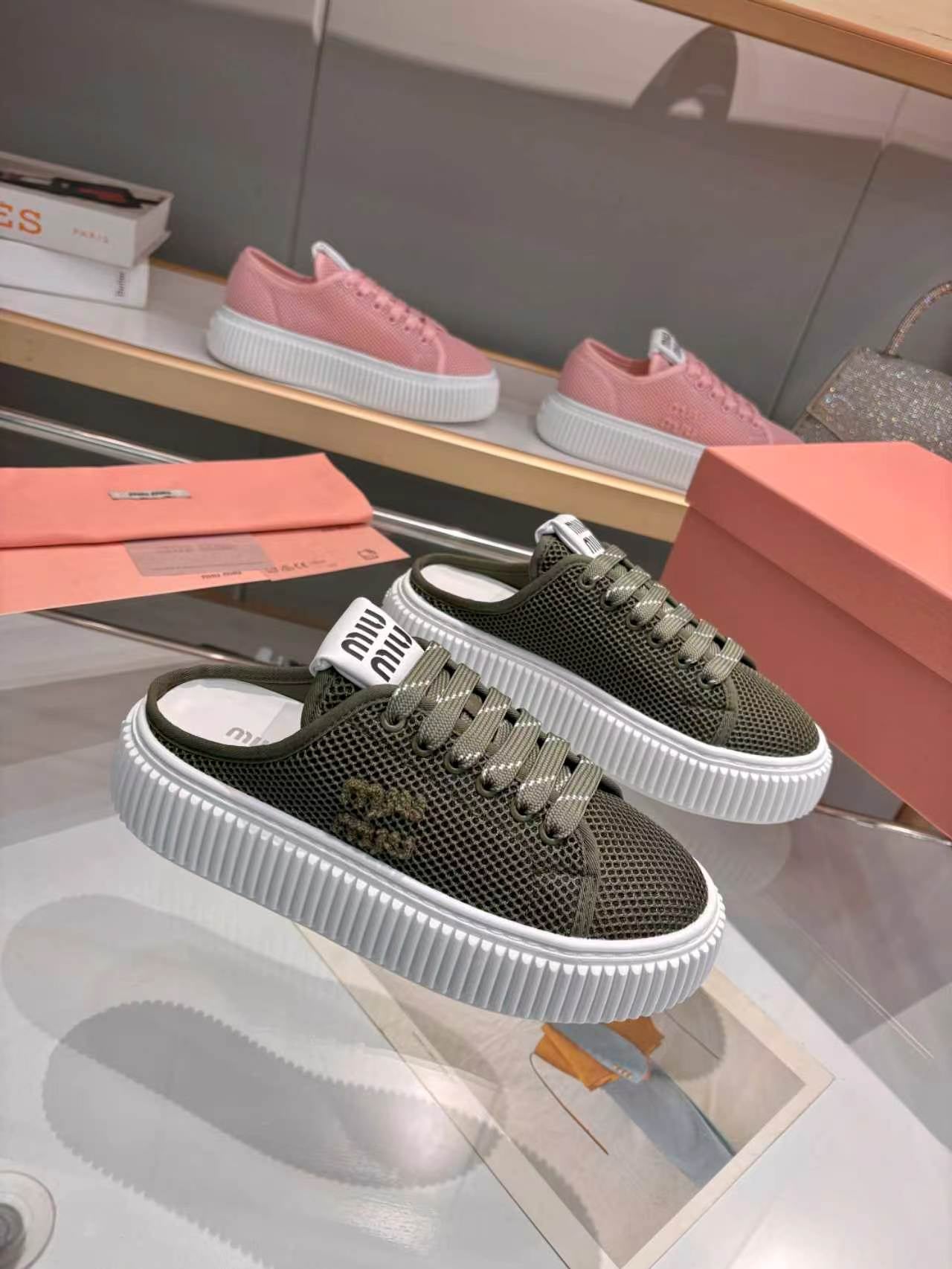 MIUMIU 26S SNEAKER MULES 45MM IN DARK OLIVE GREEN MESH