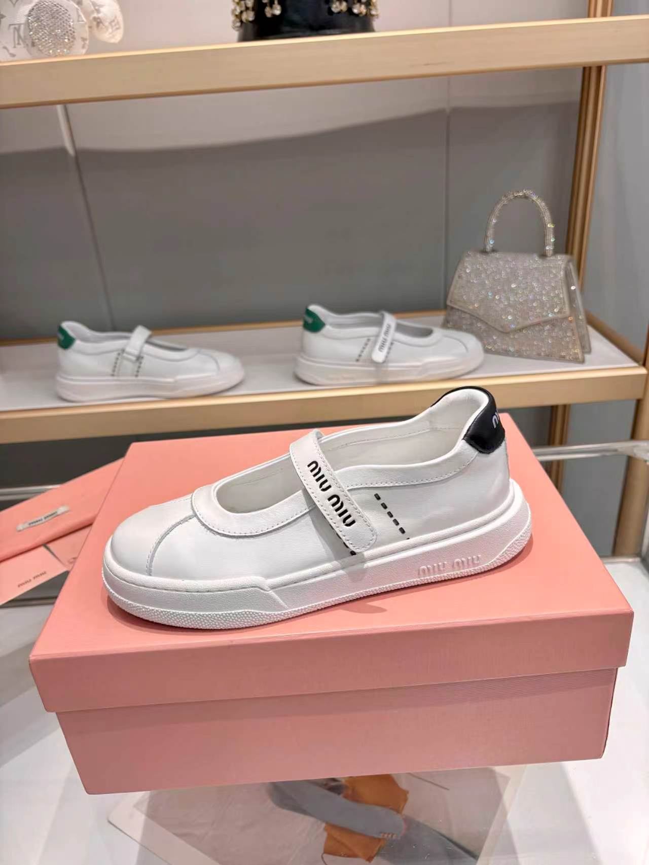 MIUMIU 26S MARY JANE BALLERINAS IN WHITE AND BLACK CALFSKIN