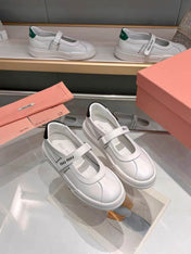MIUMIU 26S MARY JANE BALLERINAS IN WHITE AND BLACK CALFSKIN