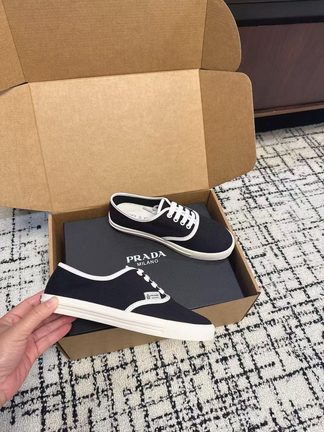 PRADA 26S LACE UP SNEAKERS IN BLACK AND WHITE CANVAS