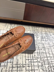 MIUMIU 26S LACE UP BOW LOAFERS IN CARAMEL BROWN CALFSKIN