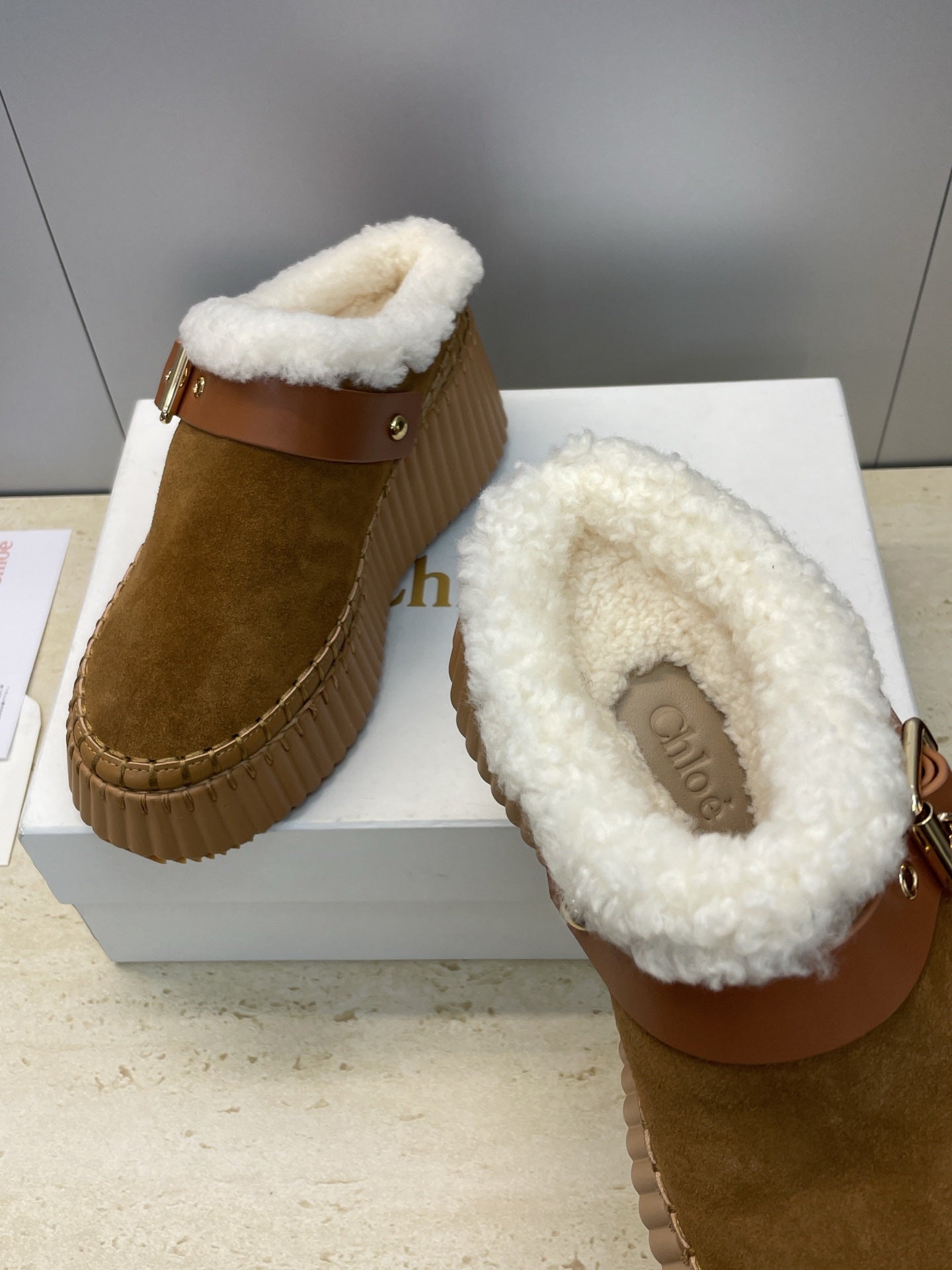 CHLOÉ 26S FUR-LINED WEDGE MULES IN BROWN SUEDE