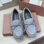 MIUMIU 26S LOAFERS IN LIGHT BLUE SUEDE WITH BOW