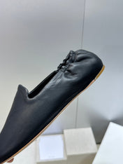 THE ROW 26S BALLET FLATS IN BLACK CALFSKIN