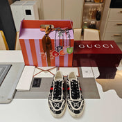 GUCCI 26S GG WEB SNEAKERS IN BLACK AND WHITE GG CANVAS