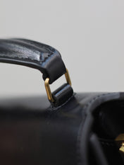 CASSANDRA MINI TOP HANDLE BAG 20 IN BLACK SMOOTH LAMBSKIN GOLD HARDWARE