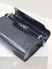 MANHATTAN MEDIUM 29 IN BLACK CROCODILE-EMBOSSED CALFSKIN SILVER BUCKLE