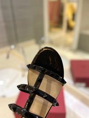 VALENTINO 26S ROCKSTUD CAGED SANDALS IN BLACK PATENT CALFSKIN