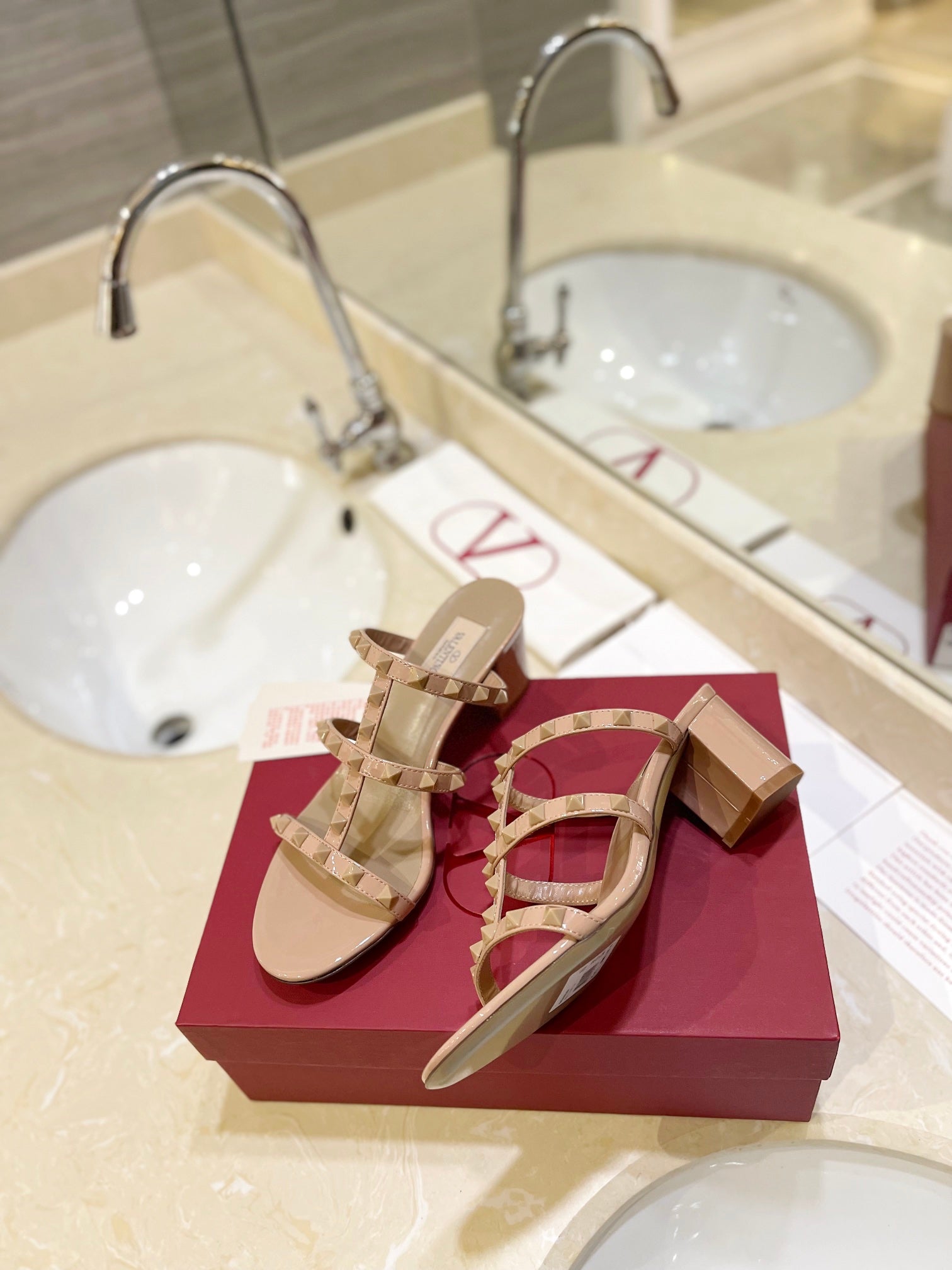 VALENTINO 26S ROCKSTUD CAGED HEELED SANDALS 60 MM IN NUDE PATENT CALFSKIN