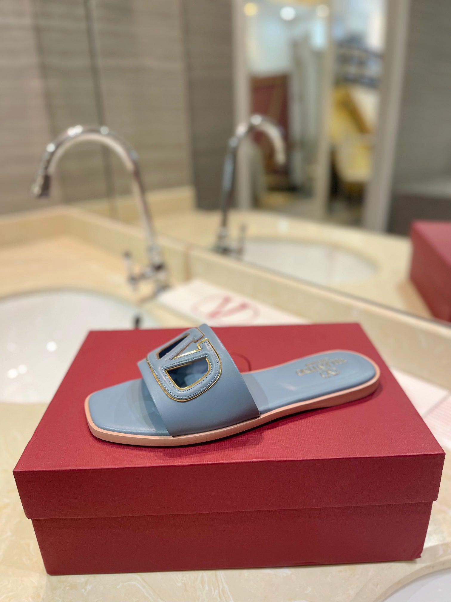 VALENTINO 26S SLIDES IN PASTEL BLUE CALFSKIN WITH LOGO