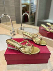 ROCKSTUD MULE SANDALS IN GOLD CALFSKIN AND TRANSPARENT PVC FILM