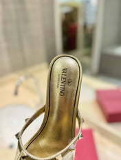 ROCKSTUD MULE SANDALS IN GOLD CALFSKIN AND TRANSPARENT PVC FILM