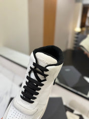 MID-TOP SNEAKERS IN WHITE AND BLACK TRIM PERFORATED LAMBSKIN