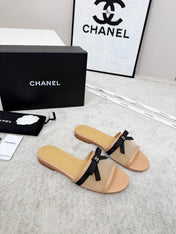 CHANEL 26S SLIDE SANDALS IN BEIGE MESH AND CALFSKIN WITH BLACK RIBBON