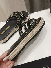 WOVEN STRAP SLIPPERS IN BLACK LAMBSKIN
