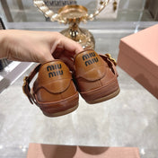 MIUMIU 26S MARY JANE FLATS IN CARAMEL BROWN CALFSKIN GOLD BUCKLE