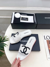 CHANEL 26S FLAT SLIDES IN WHITE LAMBSKIN WITH BLACK CC LOGO