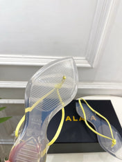 ALAIA 26S POINTED-TOE THONG SANDALS IN YELLOW AND TRANSPARENT PVC