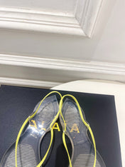 ALAIA 26S POINTED-TOE THONG SANDALS IN LIGHT YELLOW SATIN AND TRANSPARENT PVC