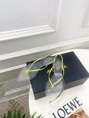ALAIA 26S POINTED-TOE THONG SANDALS IN LIGHT YELLOW SATIN AND TRANSPARENT PVC