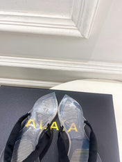 ALAIA 26S THONG SANDALS IN BLACK SATIN AND TRANSPARENT PVC