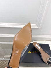 ALAIA 26S MULE HEELS 55 MM IN BLACK LAMBSKIN AND TRANSPARENT PVC