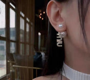 MIUMIU 26S CRYSTAL LOGO PEARL DROP EARRINGS IN SILVER TONE METAL 620414