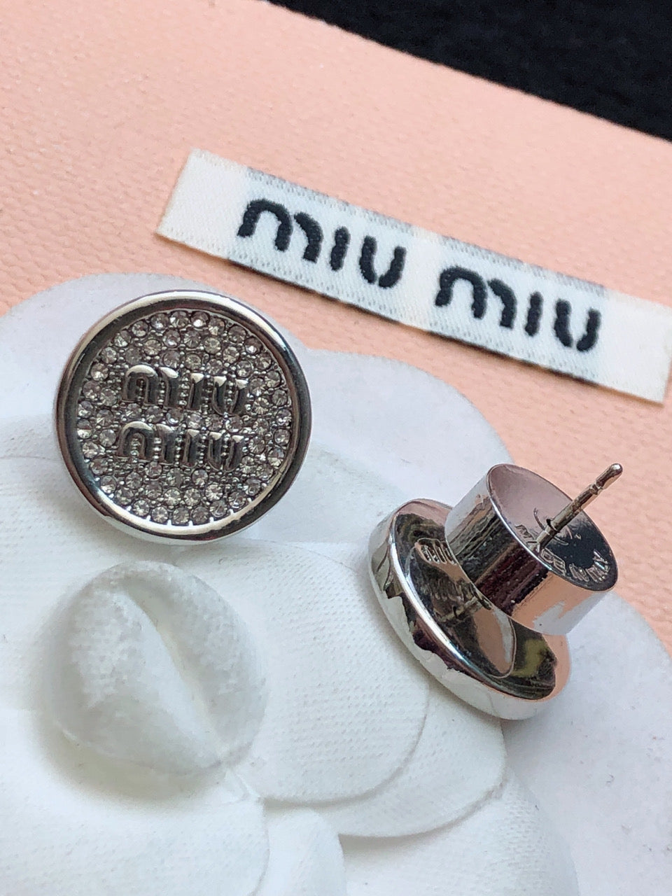 MIUMIU 26S CRYSTAL MIU LOGO ROUND STUD EARRINGS IN SILVER TONE METAL 630845