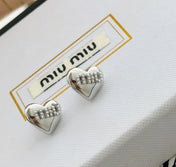 MIUMIU 26S HEART LOGO STUD EARRINGS WITH PEARL DETAILS IN SILVER TONE METAL 630844