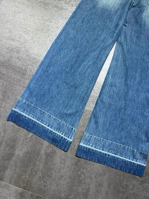 CELINE 26S HIGH-WAIST WIDE-LEG JEANS 744